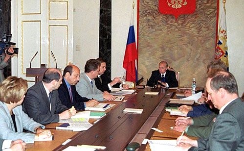 President Vladimir Putin with members of the Cabinet.
