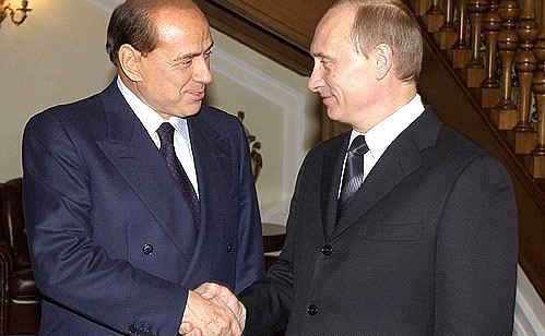 With Italian Prime Minister Silvio Berlusconi.