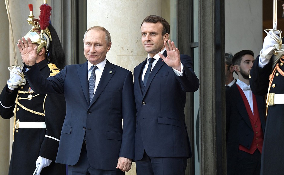 Vladimir Putin arrived at the Elysee Palace for the Normandy format summit. With President of France Emmanuel Macron.