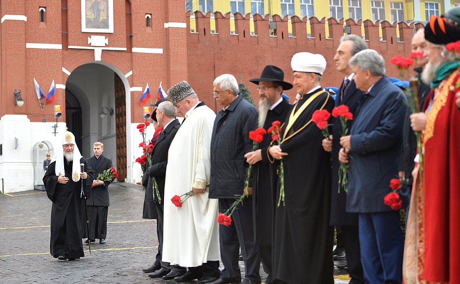 Before a flower-laying ceremony at the monument to Kuzma Minin and Dmitry Pozharsky on Red Square.