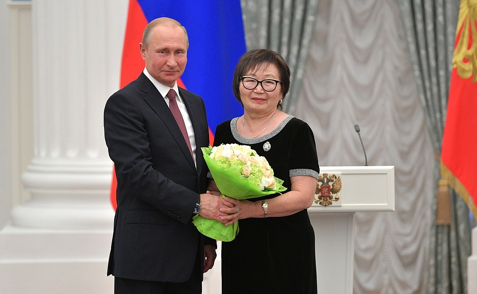 At a presentation of state decorations. Teacher of the Aga-Khangil School (Trans-Baikal Territory) Rimma Dondokova has received the honorary title of Honoured Teacher of the Russian Federation.