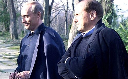 President Putin taking a walk with Italian Prime Minister Silvio Berlusconi.