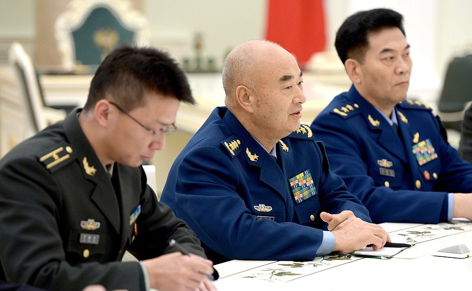 На встрече с заместителем председателя Центрального военного совета КНР Сюй Циляном.