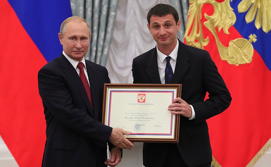 A letter of recognition for contribution to the development of Russia football and high athletic achievement is presented to Russia national football team player Alan Dzagoyev.