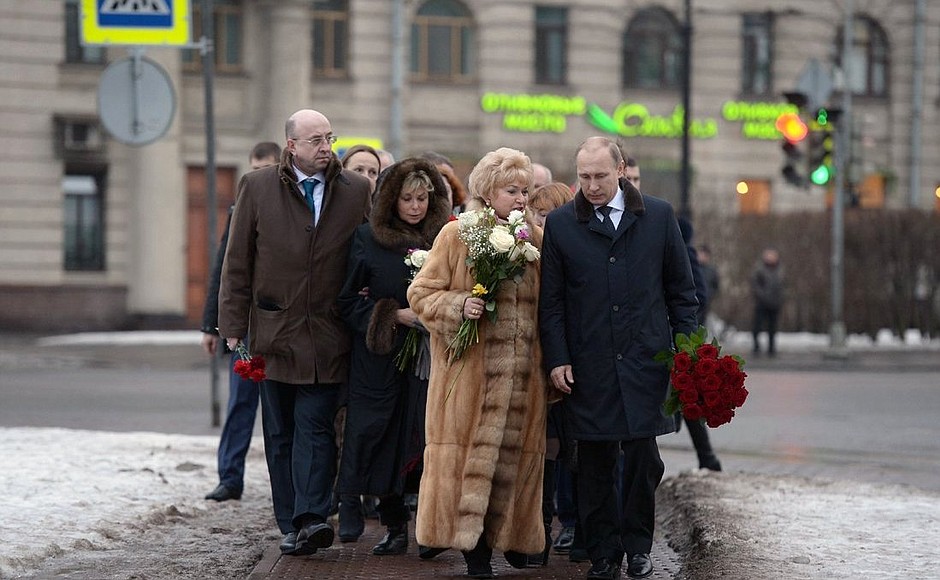 Before laying flowers at the monument to Anatoly Sobchak.