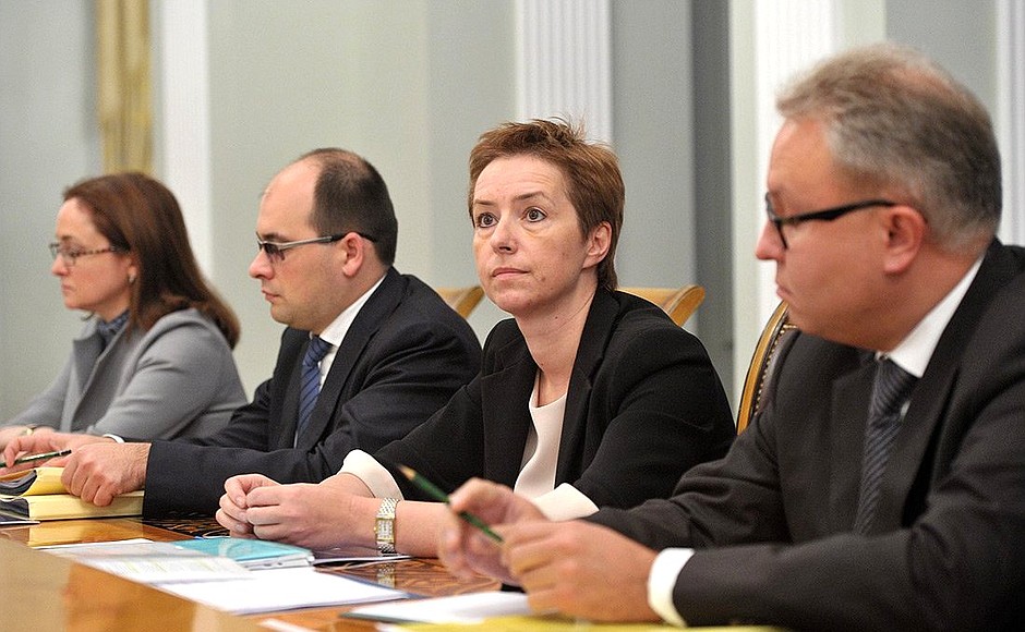 Presidential Aide Elvira Nabiullina, Presidential Adviser Anton Ustinov, Deputy Minister of Economic Development — head of the Federal Agency for State Property Management Olga Dergunova, and IDGC Holding CEO Andrei Murov at a meeting on improving efficacy of asset management in power supply sector.