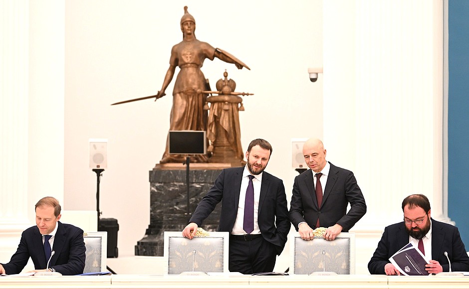 Before a meeting on the socioeconomic development of the new Russian regions. From left: Deputy Prime Minister and Minister of Industry and Trade Denis Manturov, Presidential Aide Maxim Oreshkin, Finance Minister Anton Siluanov and Minister of Digital Development, Communications and Mass Media Maksut Shadayev.
