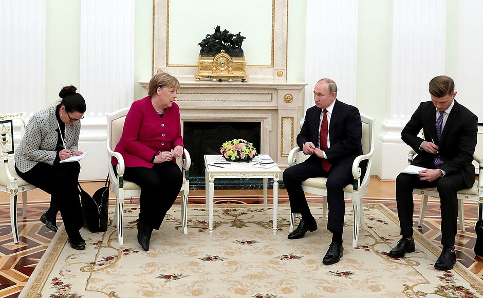 Meeting with Federal Chancellor of Germany Angela Merkel in a restricted format.