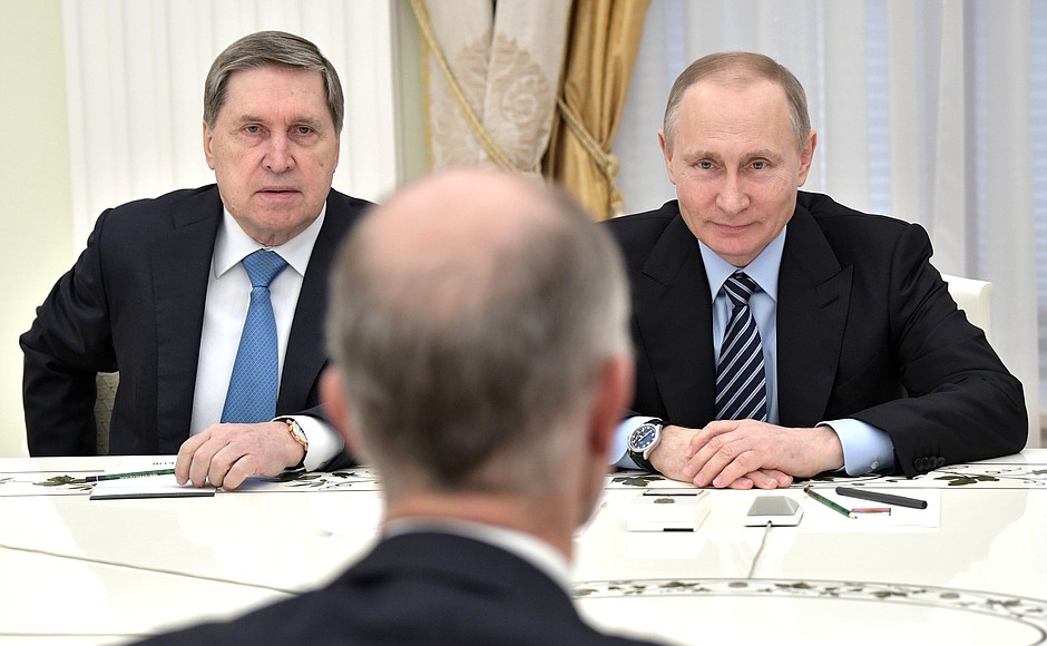 At a meeting with BASF President and CEO Kurt Bock. Left: Presidential Aide Yury Ushakov.