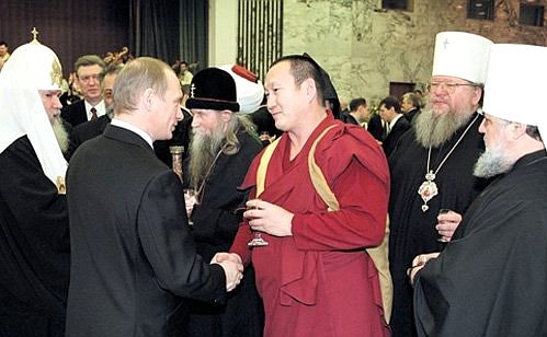 President Vladimir Putin and the clergy at a reception dedicated to Constitution Day.