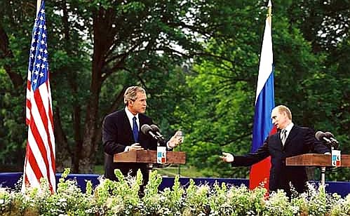 President Putin at a joint press conference with U.S. President George Bush.