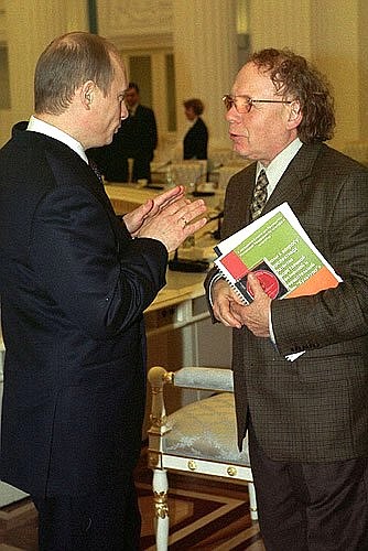 President Putin with playwright and historian Edward Radzinsky after a session of the Council for Culture and the Arts.