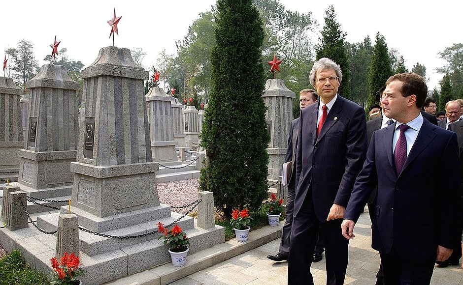With Russian Ambassador to China Sergei Razov during a visit to the Russian military cemetery.