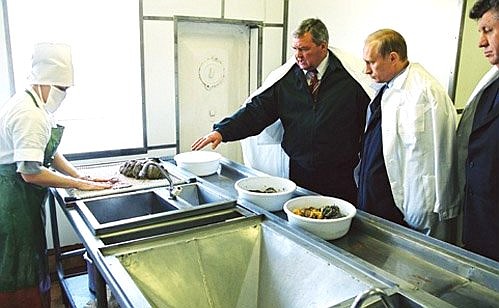 President Putin visiting a fish-factory vessel in the Ikryaninsky District.