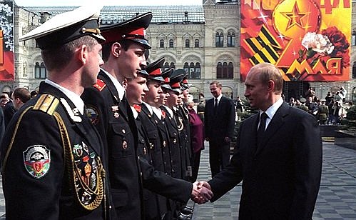 President Putin with graduates of military schools after a military parade devoted to the 58th anniversary of victory in the Second World War.