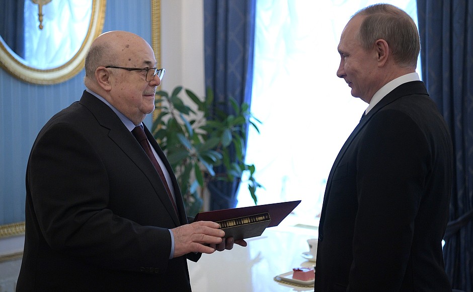 With Artistic Director of Moscow Et Cetera Theatre Alexander Kalyagin. Mr Putin congratulated Mr Kalyagin on his 75th birthday and presented him with a book about the first Russian expedition to Brazil and a dinner set with quotations from classic works by Russian writers and poets.
