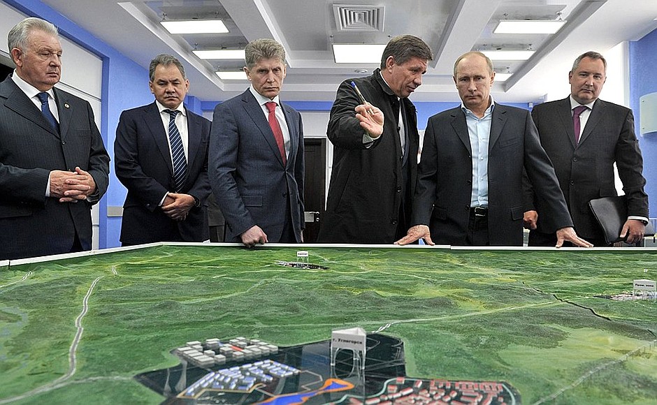 Looking at a model of the Vostochny Space Launch Centre.