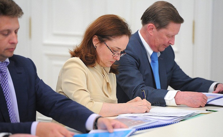 Before the meeting on prospects of developing the United Shipbuilding Corporation. Left to right: transport Minister Maxim Sokolov, Presidential Aide Elvira Nabiullina and Chief of Staff of the Presidential Executive Office Sergei Ivanov.