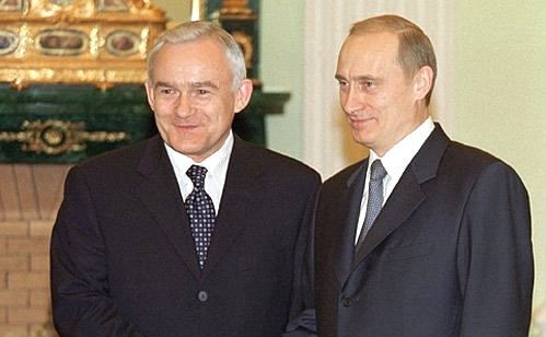 President Putin with Polish Prime Minister Leszek Miller.