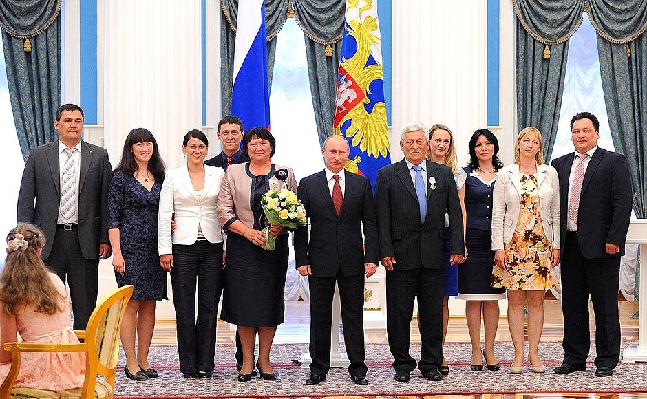 At a ceremony awarding the Order of Parental Glory to parents of large families.