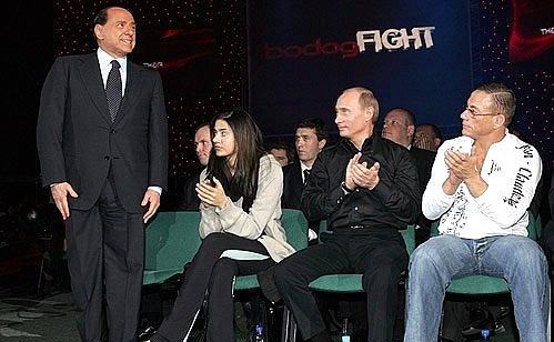 From right to left: with actor Jean-Claude Van Damme, his daughter Bianca, and former Italian Prime Minister Silvio Berlusconi at the mixed martial arts tournament.