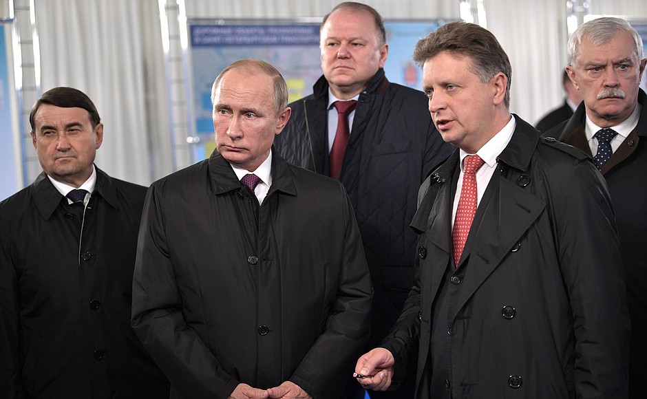 Vladimir Putin took part in the launch of a reconstructed road section in Leningrad Region. From left to right: Aide to the President Igor Levitin, Plenipotentiary Presidential Envoy in the Northwest Federal District Nikolai Tsukanov, Transport Minister Maxim Sokolov and Governor of St Petersburg Georgy Poltavchenko.