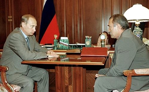 Vladimir Putin met with Aslanbek Aslakhanov, a Chechen representative in the State Duma.