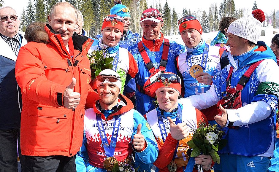 With Russia’s National Paralympic Committee President Vladimir Lukin and Russian athletes Roman Petushkov, Vladislav Lekomtsev, Grigory Murygin and Rushan Minnegulov (left to right) who won gold medals in the open relay event at the Sochi Paralympics.