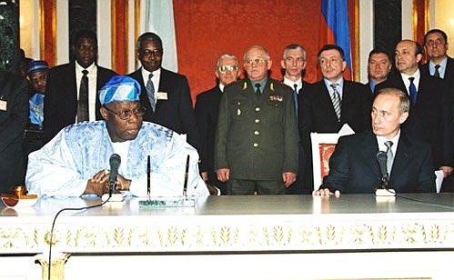 President Putin at a joint news conference with Nigerian President Olusegun Obasanjo.