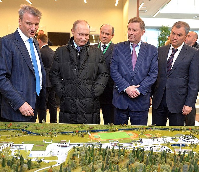 At the exhibition at Sberbank Corporate University. Left to right: CEO and Board Chairman of Sberbank German Gref, Vladimir Putin, Chief of Staff of the Presidential Executive Office Sergei Ivanov and First Deputy Chief of Staff of the Presidential Executive Office Vyacheslav Volodin.