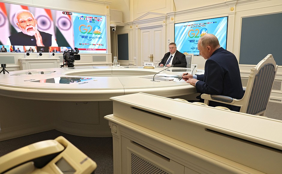 With Deputy Prime Minister Alexei Overchuk during the extraordinary G20 Summit (via videoconference).