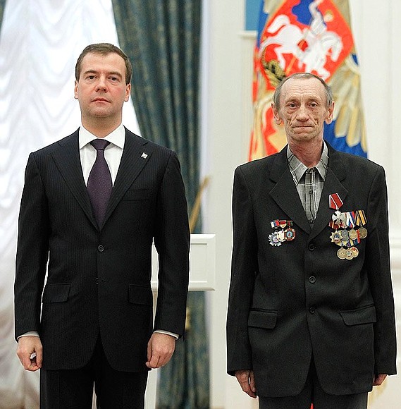 Ceremony presenting state decorations. Vyacheslav Gryzunov, a liquidator who took part in the clean-up operations at the Chernobyl nuclear power plant, received the Order of Courage.