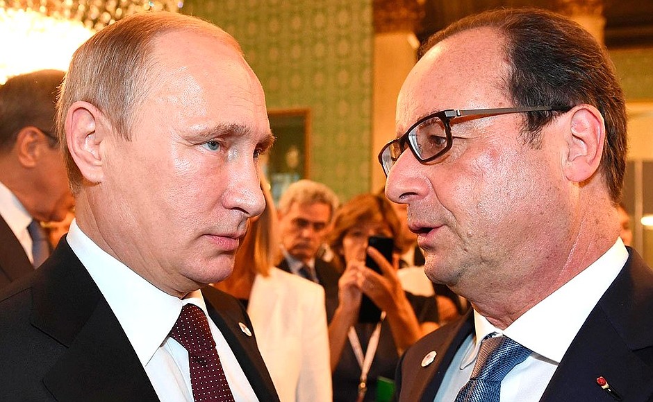 With President of France Francois Hollande before a working breakfast hosted by Italian Prime Minister Matteo Renzi.