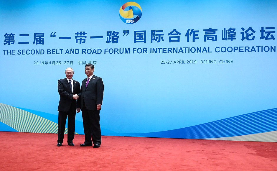 With President of the People's Republic of China Xi Jinping before a roundtable discussion at the Belt and Road Forum for International Cooperation.