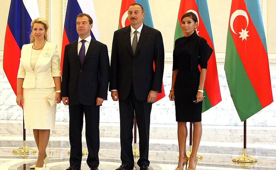 Dmitry Medvedev with his wife Svetlana and Ilham Aliyev with his wife Mehriban.