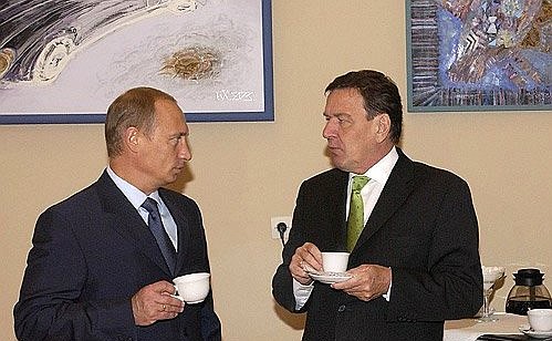 President Putin with German Chancellor Gerhard Schroeder.