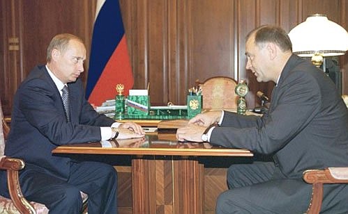 President Vladimir Putin meeting Vladimir Yelagin, the minister with responsibility for coordinating the work of federal government agencies in social and economic issues in the Chechen Republic.
