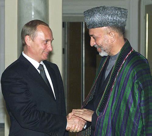 President Vladimir Putin and the head of Afghanistan\'s Interim Government Hamid Karzai.