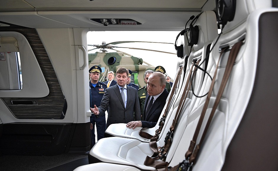 Examining aircraft during a visit to Gorbunov Kazan Aviation Plant.