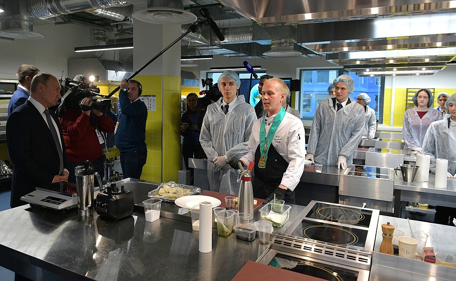 Vladimir Putin tours the workshops of the Technograd recreational and educational complex at VDNKh.