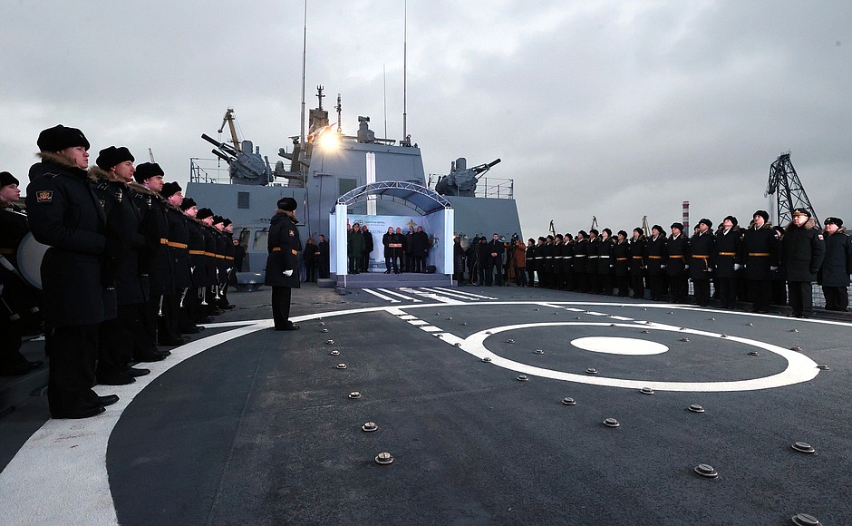 Ceremony for raising flags on ships entering Navy service.