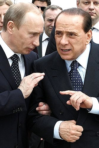 With Silvio Berlusconi.