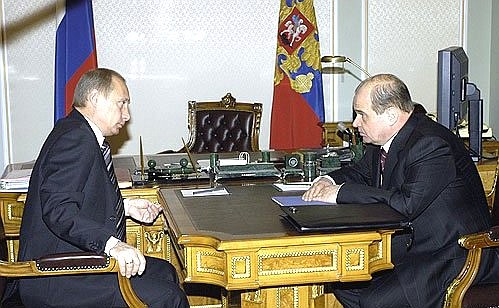 President Putin meeting with Minister Stanislav Ilyasov.