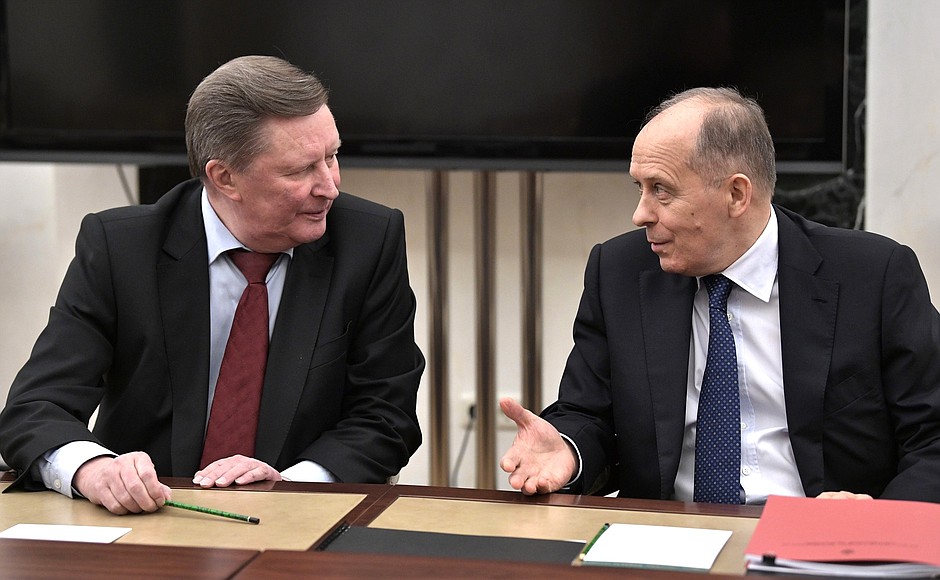 Before a meeting with permanent members of the Security Council. Special Presidential Representative for Environmental Protection, Ecology and Transport Sergei Ivanov with Director of the Federal Security Service Alexander Bortnikov.