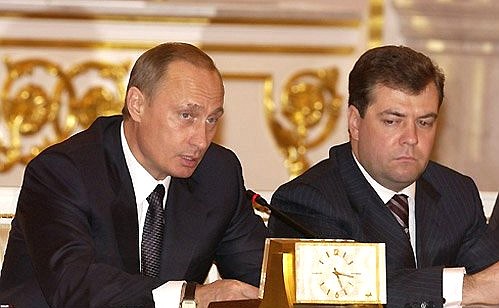 President Vladimir Putin chairing a joint meeting of the Security Council and the State Council Presidium. Presidential Executive Office head Dmitry Medvedev, right.