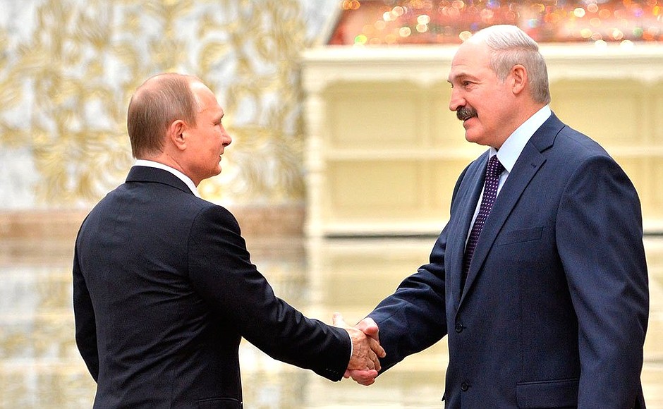 With President of Belarus Alexander Lukashenko before the beginning of talks in the Normandy format.