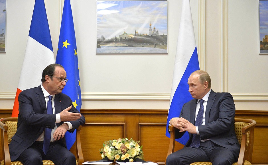 With French President François Hollande.