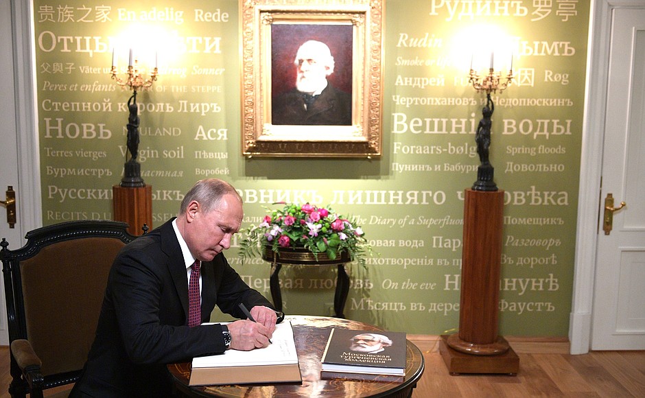 Vladimir Putin signs the distinguished visitors’ book during his visit to the restored Ivan Turgenev Museum-House on Ostozhenka Street.