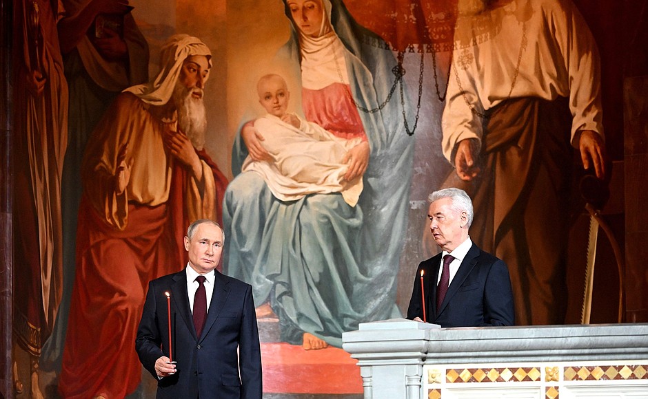 With Moscow Mayor Sergei Sobyanin at Easter service at the Christ the Saviour Cathedral.