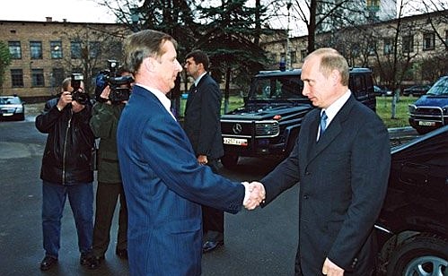 President Vladimir Putin visiting the Main Intelligence Directorate with Russia\'s Defence Minister Sergei Ivanov.